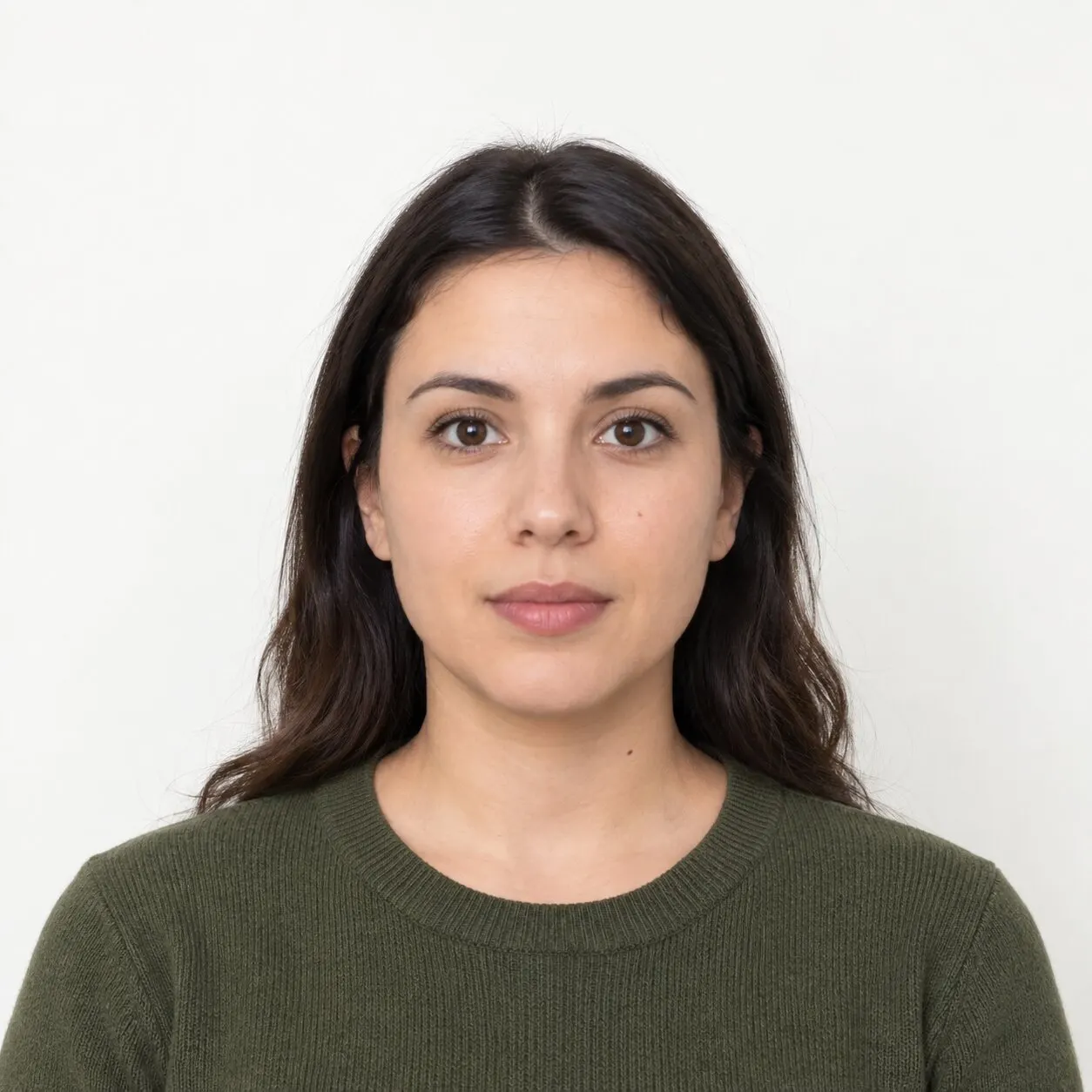 Illustrative example of a centered, front-facing person against a plain light background